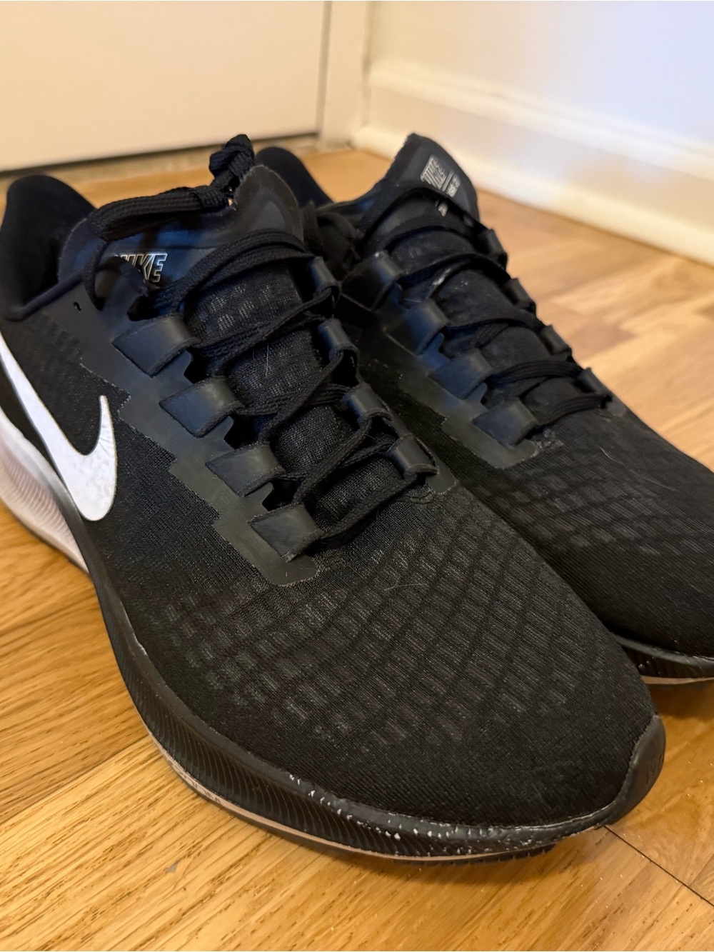 Nike Black with White Swoosh Performance Trainers